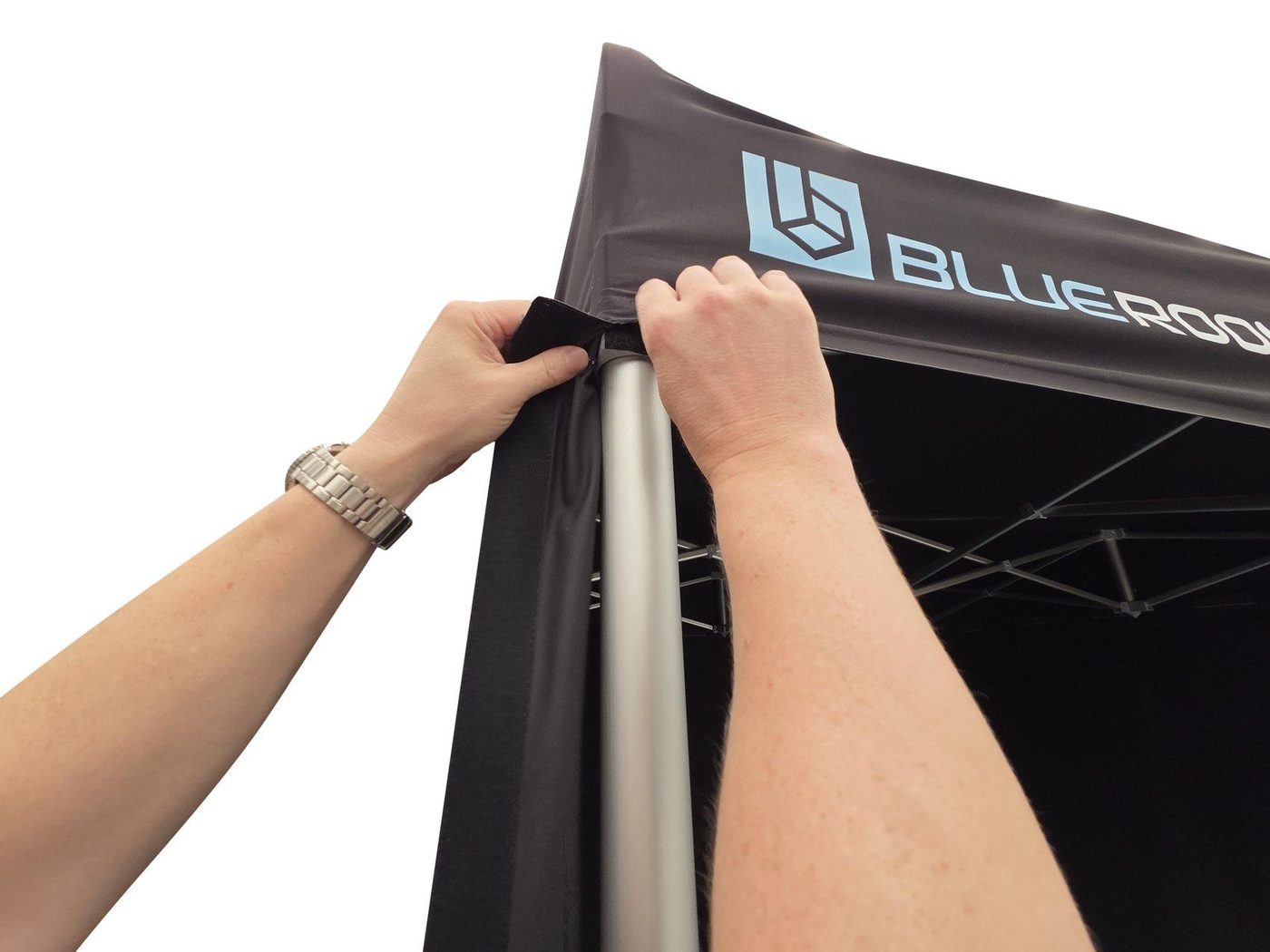 Velcroing blackout fabric around leg